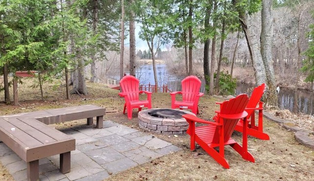 Whispering Pines Riverside Retreat