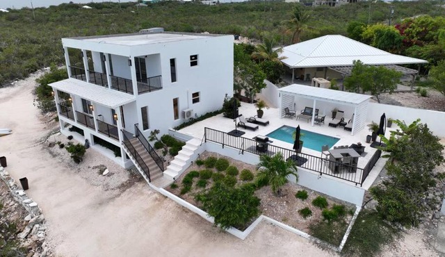 White Modern Flamingo Lake Villa