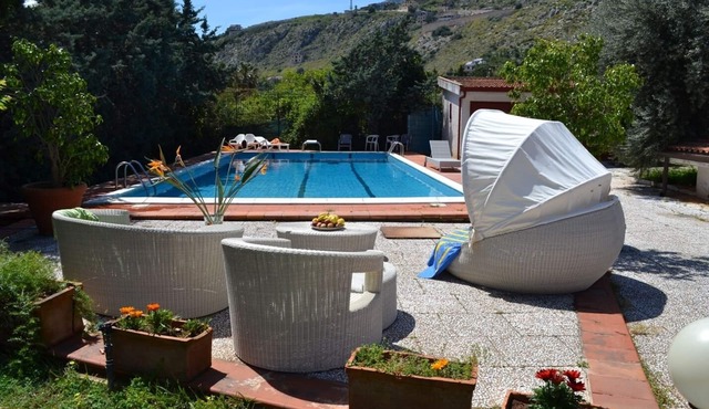 wonderful villa with private swimming pool, garden flowers and citrus