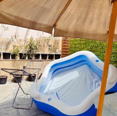 Your Cairo retreat - Cozy 2BR apartment with spacious rooftop in premium compound