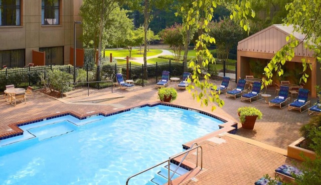 Your Home Away From Home! 4 Comfortable units w/ Kitchen. Near Green Space