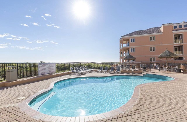Adorable Ground Floor Condo with Heated Pool, Hot Tub, Tennis Court & Direct Beach Access!