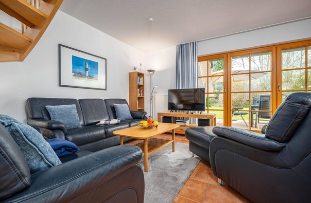 Comfortable semi-detached house with terrace, garden view and heated pool -