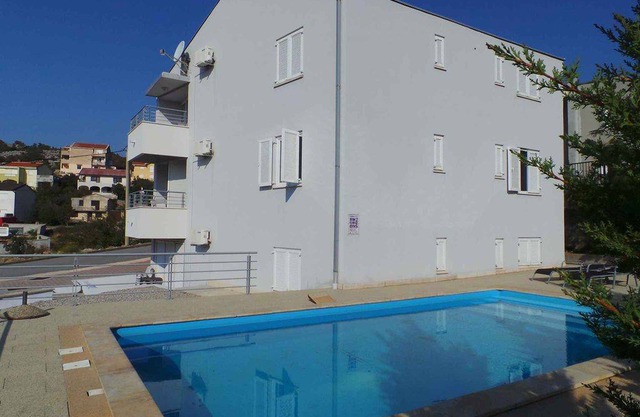 Holiday apartment with use of pool and balcony