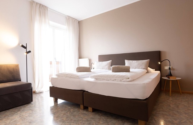 Lovingly Furnished Apartment with Balcony and Stunning City Views at Residence Margreth