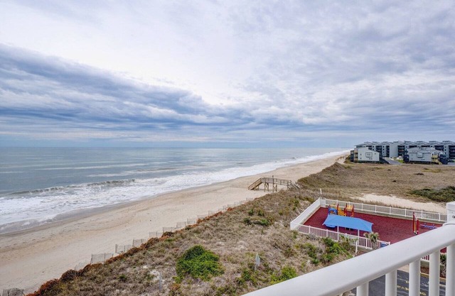 Oceanfront Point Unit, with wine fridge, steps to the beach