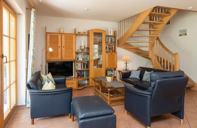 Spacious semi-detached house with garden, terrace and pool in the Zingst vacation park -