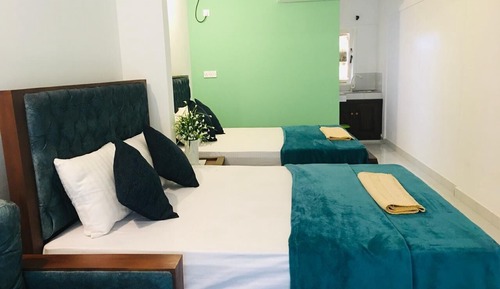 Deluxe Quadruple Room, Balcony, Garden View