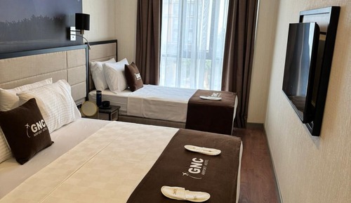 Deluxe Triple Room, City View