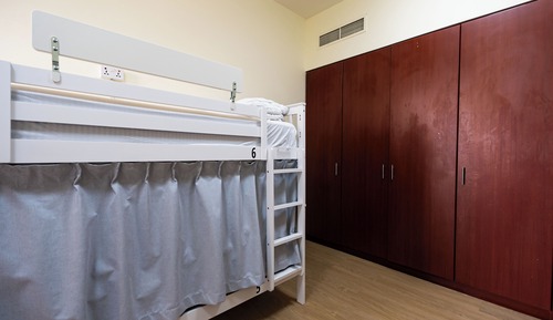 Bunk bed in Men-Only Dormitory. Comfort Room, City View
