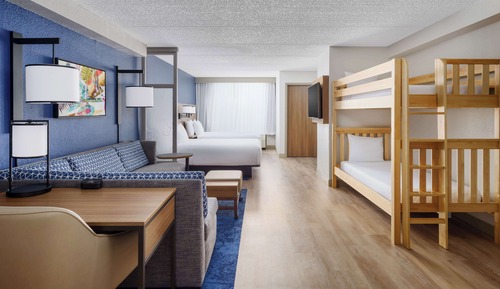 Room (2 Queen, Sofabed, and Bunk Beds)